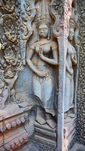 Stone rock carving art at Ta Prohm Temple in Angkor wat complex, Siem Reap Cambodia.