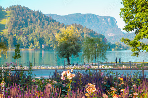 Lake Bled with colorful flower field in Slovenia