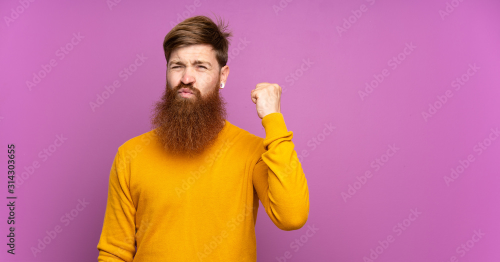 Redhead man with long beard over isolated purple background with angry gesture Redhead man with long beard over isolated purple background with angry gesture