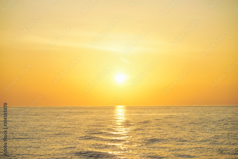 Golden sunrise and golden north andaman sea . Sunrise over the sea near Similan Islands National Park, Phang Nga Province, Thailand, Asia.