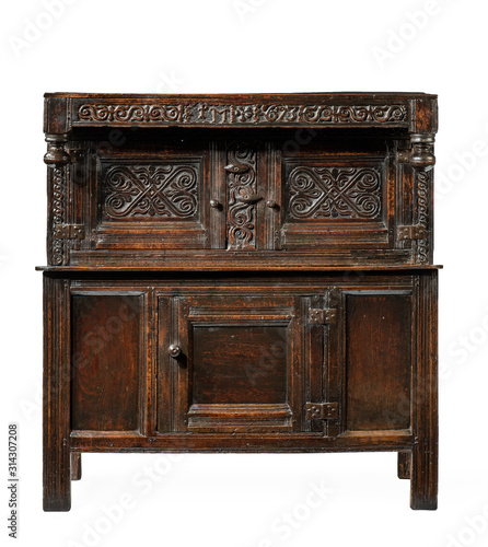 A fine 17th Century oak livery court cupboard large with fine carving isolated on white