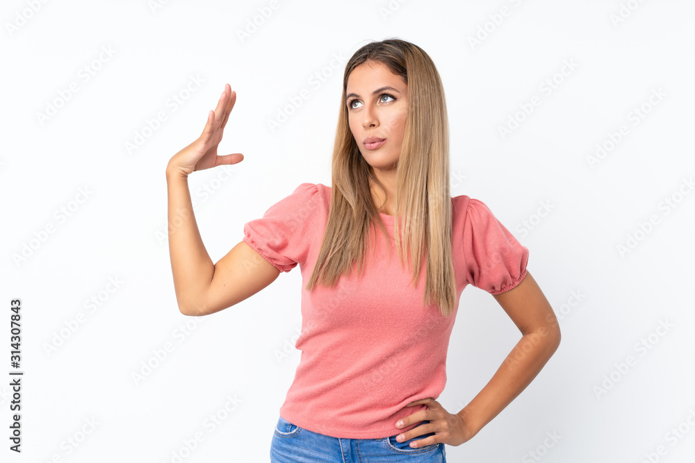 Young blonde woman over isolated white background with tired and sick expression Young blonde woman over isolated white background with tired and sick expression