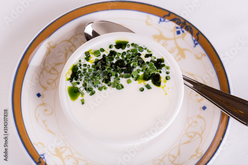 Sour cream with finely cut onions, served with borch photo