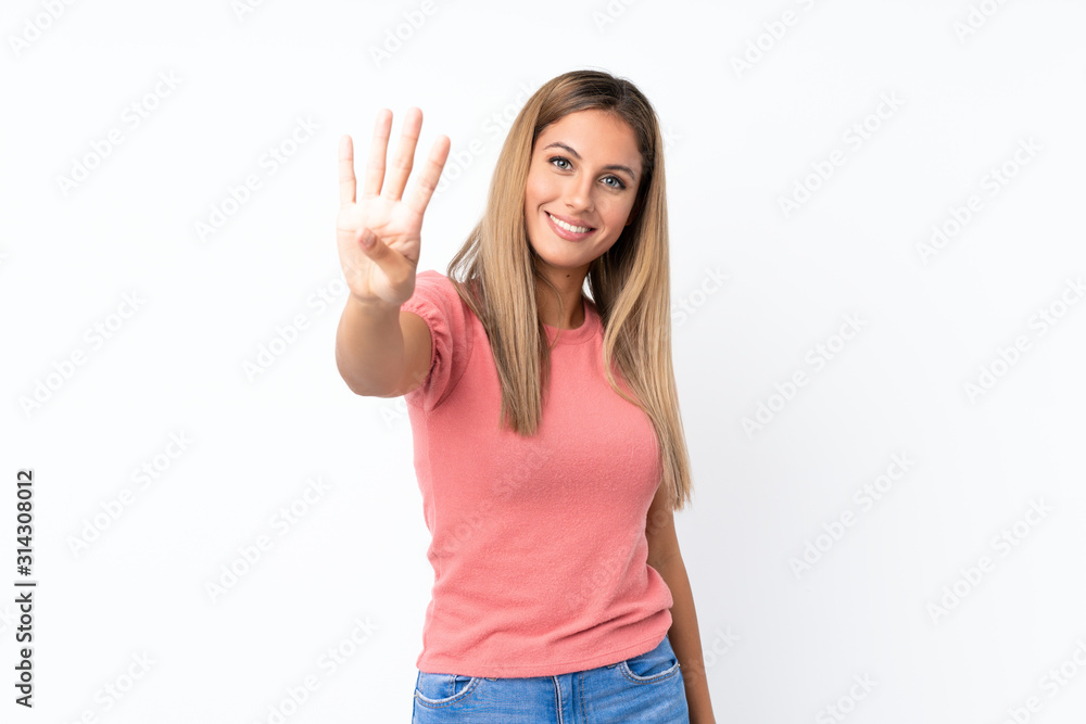 Young blonde woman over isolated white background happy and counting four with fingers Young blonde woman over isolated white background happy and counting four with fingers