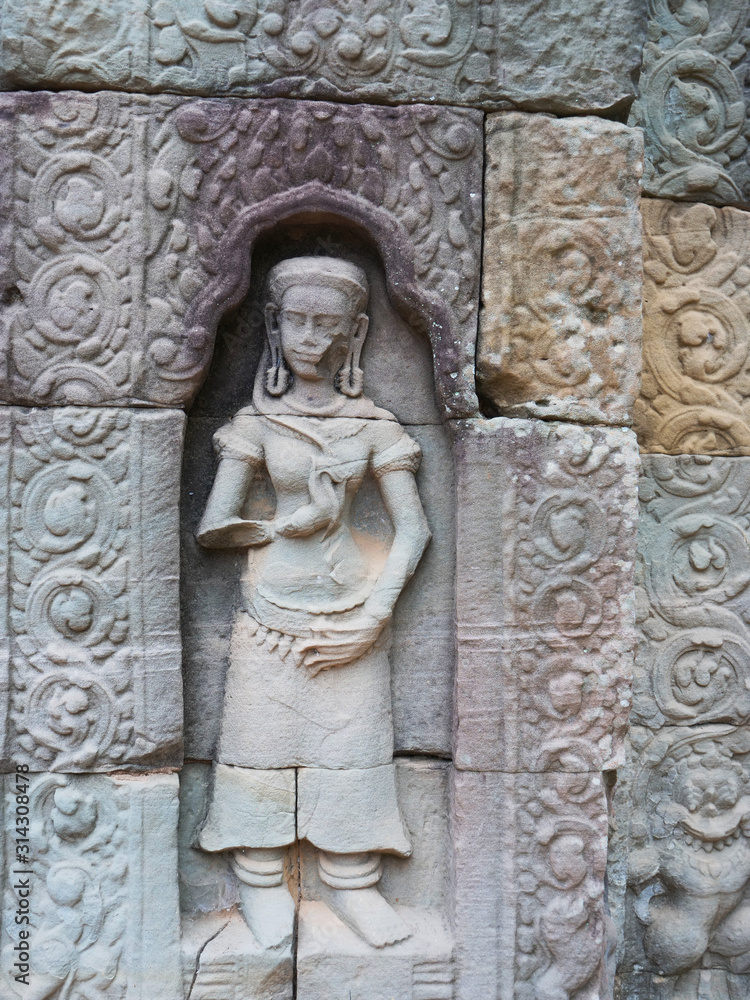 Stone rock carving art at Ta Som temple in Angkor Wat complex, Siem Reap Cambodia.