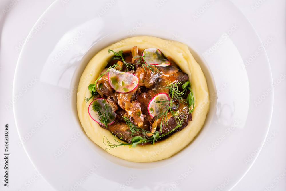 Puree potatoes with fried mushrooms and fried meat with greens Puree potatoes with fried mushrooms and fried meat with greens