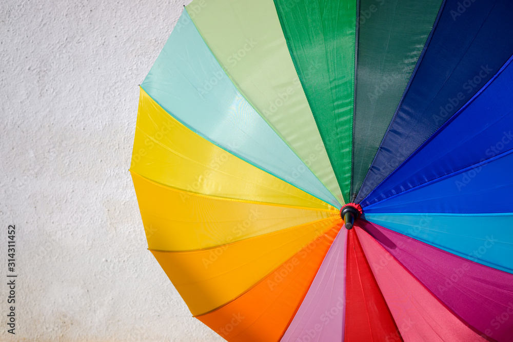LGBT Umbrella protects rights, shining in the sun with many colors. LGBT Umbrella protects rights, shining in the sun with many colors.
