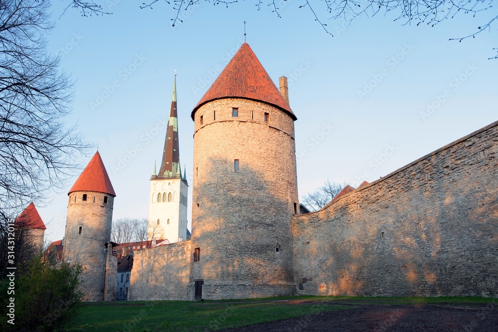 View on the castle wall with towers Old Town of Tallin, Estonia. UNESCO heritage in Europe