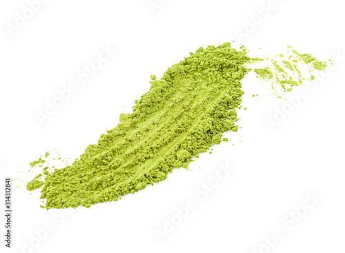 Green matcha powder on white background. Matcha made from finely ground green tea powder. Eat healthy because of high antioxidants. photo