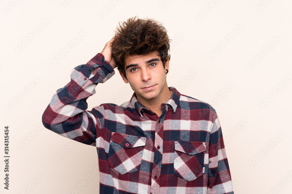 Young caucasian man with an expression of frustration and not understanding Young caucasian man with an expression of frustration and not understanding