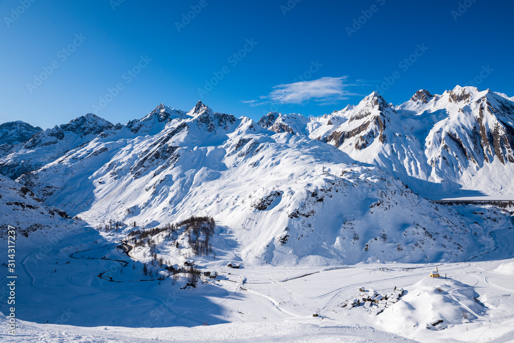 Fototapeta premium Riale, a typical Val Formazza village with snow.