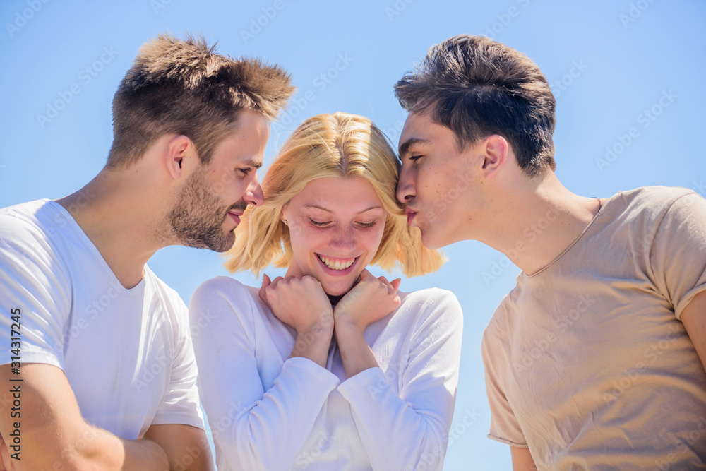 Friend zone concept. Happy together. Cheerful friends. People outdoors. Happy woman and two men. Friendship love. Friendship relations. Member friendship wishes to enter into romantic relationship Friend zone concept. Happy together. Cheerful friends. People outdoors. Happy woman and two men. Friendship love. Friendship relations. Member friendship wishes to enter into romantic relationship