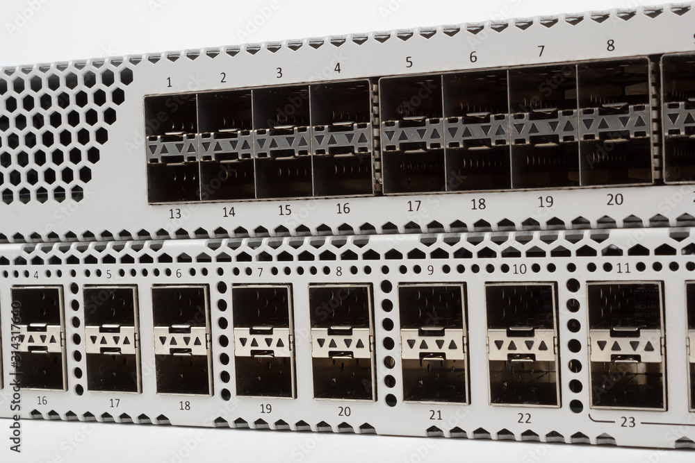 detail of fiber optic gigabit ethernet switch with SFP module slot and UTP category 5 connectors RJ-45 detail of fiber optic gigabit ethernet switch with SFP module slot and UTP category 5 connectors RJ-45