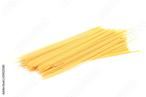 Yellow long spaghetti on a white isolated background