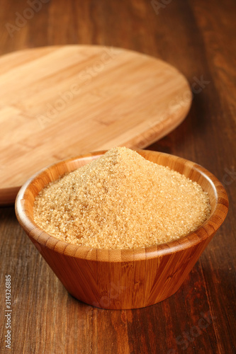 Cane Sugar in wooden bowl