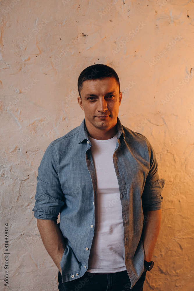 Photo session of a young guy. Classic portrait of a confident man. Photo session of a young guy. Classic portrait of a confident man.