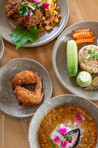 northern thai food on wooden table