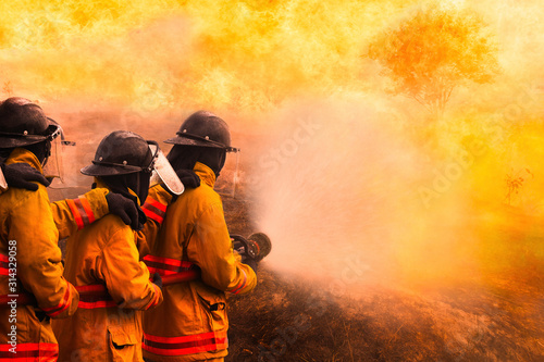 Obraz na plátne Fireman fighting a bush fire in Australia forest