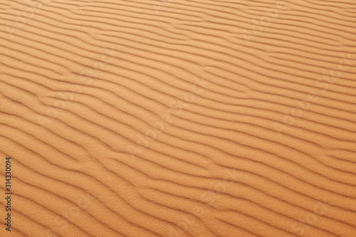 Orange desert sand patterns for a warm background