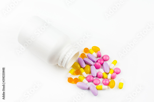 various medicines, colored capsules, pills, pharmacy drugs on a white background, the concept of medicines, pharmacy business