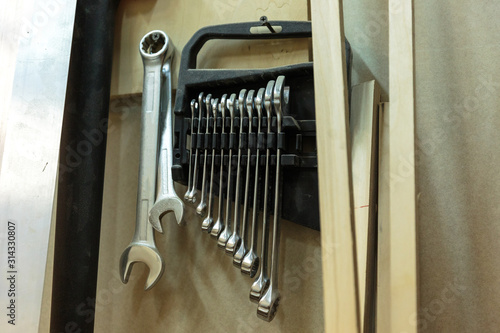 set of carpenters tool on tne wood and shavings photo