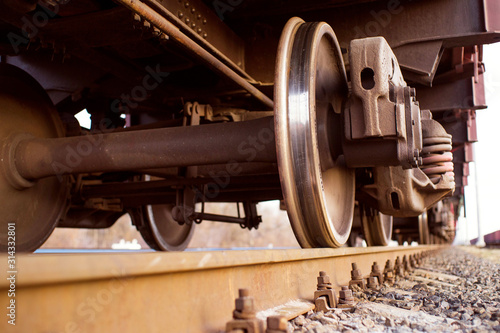 Wheel of a railway train. Freight train on the railway tracks