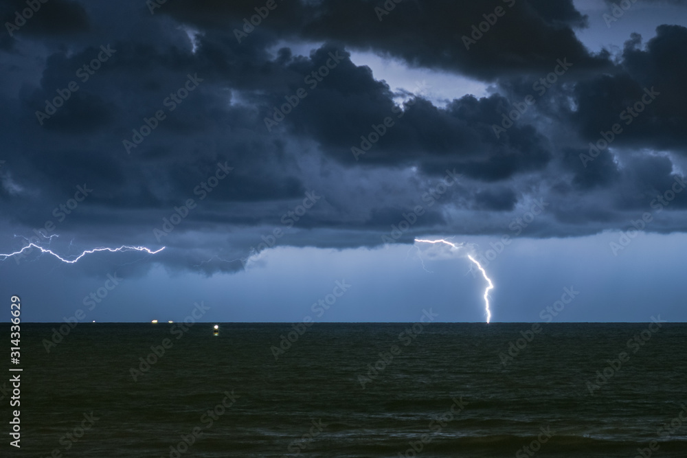 Dramatic clouds and lightning strike over the North Sea