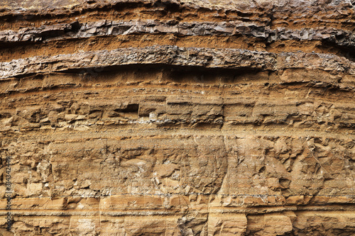 Geological layers of earth - layered rock. Close-up of sedimentary rock in Iceland, Europe