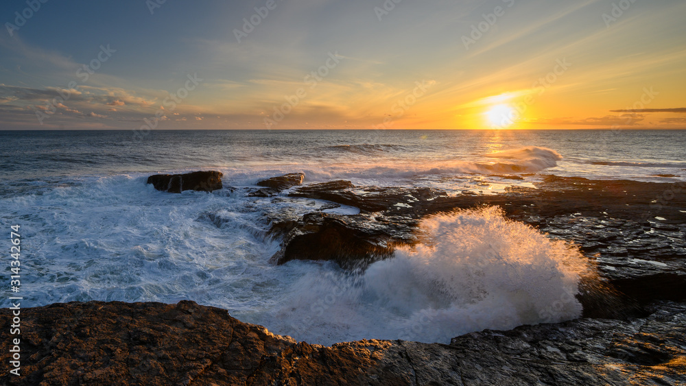 Fototapeta premium Sunset behind celtic sea in Ireland