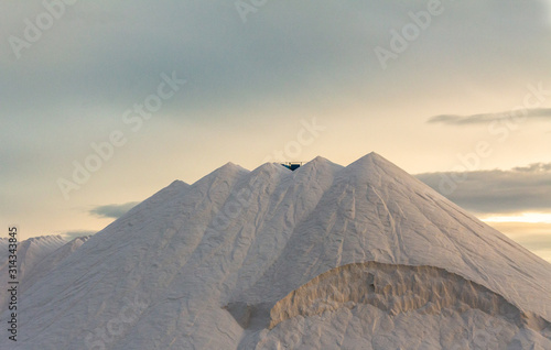 salt mountains over blue sky at sunset