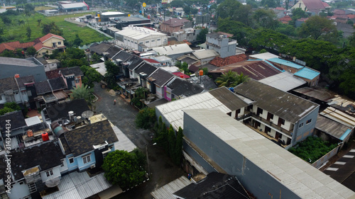 BEKASI, WESTJAVA, INDONESIA : JANUARY 10 2020 : Aerial shot view with a drone at house and highway photo