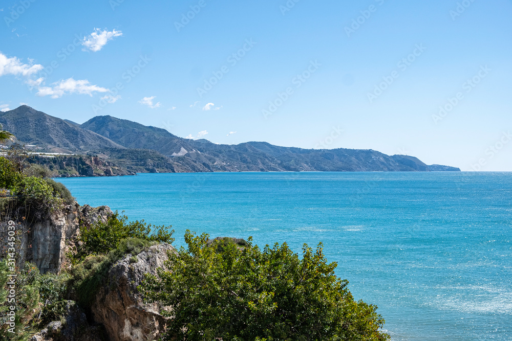 blue sea and rocks in sunny day, Spain