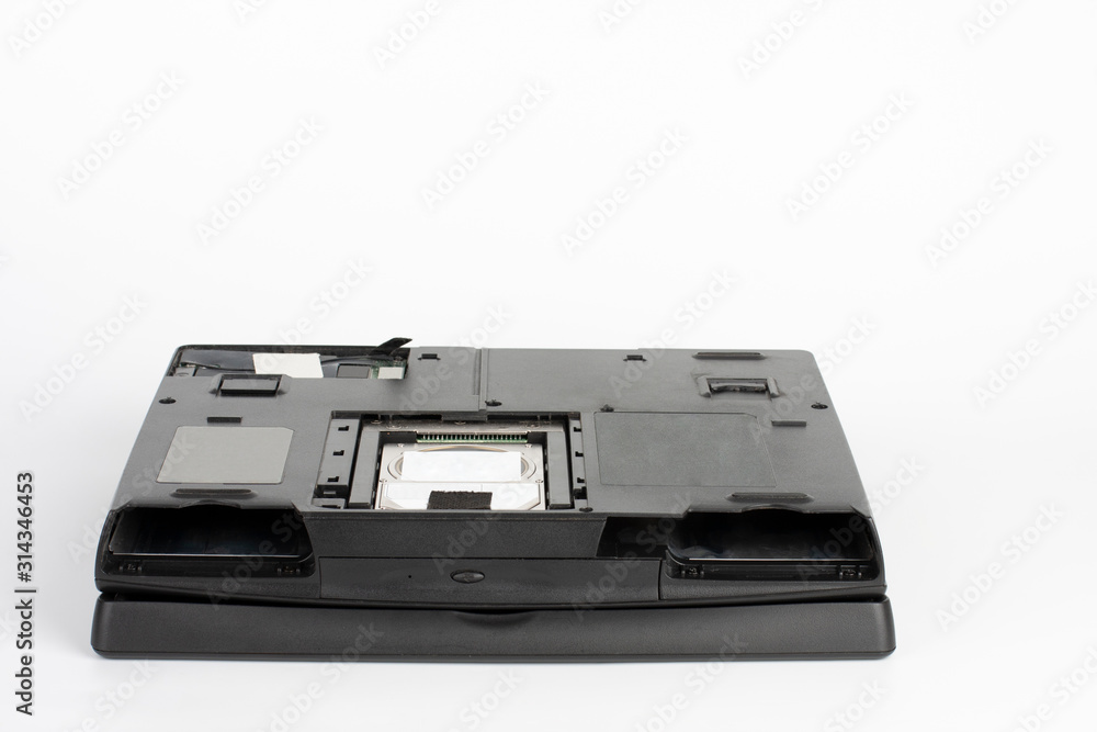 View of the underside of the laptop, removed the hard disk drive cover, removed the battery and floppy disc drive View of the underside of the laptop, removed the hard disk drive cover, removed the battery and floppy disc drive