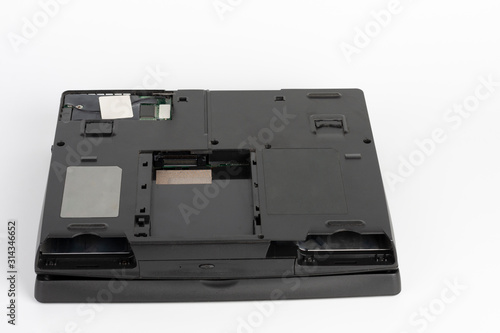 View of the underside of the laptop, removed the hard disk drive, removed the battery and floppy disc drive