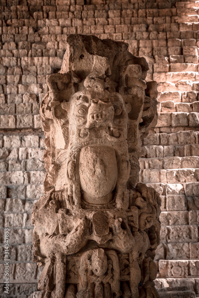 Detail of the face of the most important figure of Copan Ruinas temples. Honduras