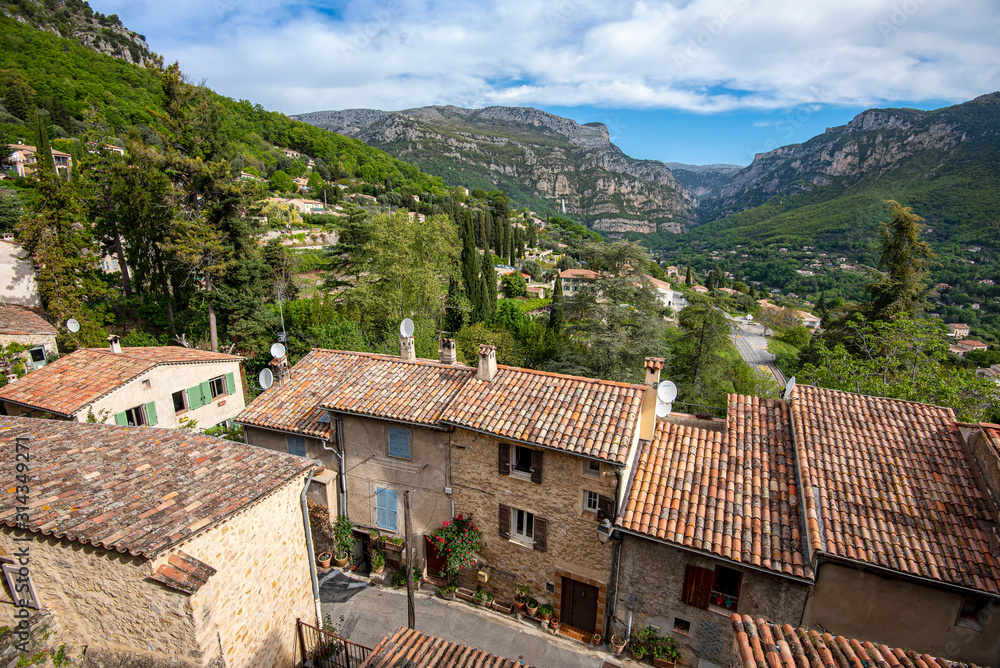 The Loup gorge as seen from the Church square of Le Bar-sur-Loup village in Southeastern France. Old village houses are at foreground.
