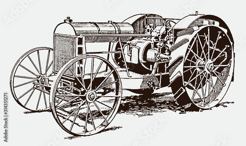 Wallpaper Mural Historical tractor in three-quarter front view. Illustration after an engraving from the early 20th century Torontodigital.ca