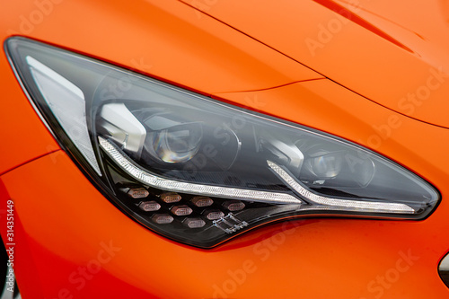 Front light of orange car