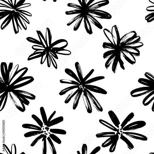 Brush flower vector seamless pattern. Hand drawn botanical ink illustration with floral motif. Camomile or daisy painted by brush.
