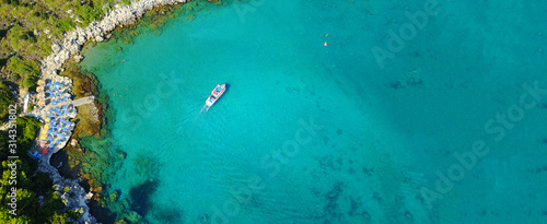 Aerial drone ultra wide photo of famous paradise rocky bay and beach of Anthony Quinn in Rodos island, Dodecanese, Greece