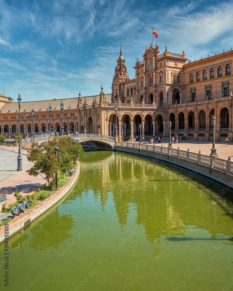 The beautiful Plaza de Espana in Seville on a sunny summer day. Andalusia, Spain.