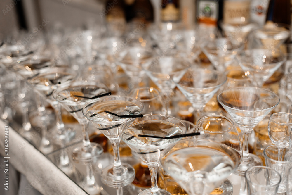 Bar with alcohol drinks on the banquet buffet table