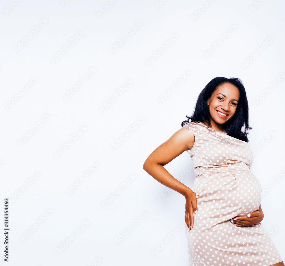 young pretty african american woman pregnant happy smiling, posing on white background isolated , lifestyle people concept copyspace close up young pretty african american woman pregnant happy smiling, posing on white background isolated , lifestyle people concept copyspace close up