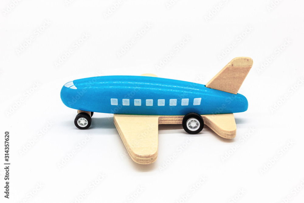 Blue Wooden Airplane Isolated on White Background. Perfect for a baby boy toy concept. Blue Wooden Airplane Isolated on White Background. Perfect for a baby boy toy concept.