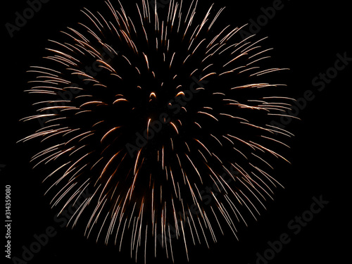 Colorful firework in night sky close up