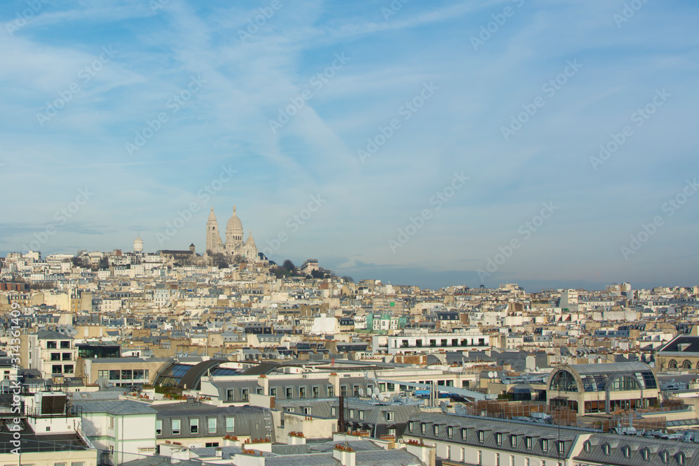 Paris city landscape with Basilica of the Sacré Cœur de Montmartr in the background