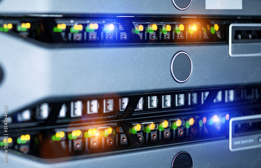 Server units in cloud service data center showing flickering light indicators for massive data connection bandwidth, close up shot. Server units in cloud service data center showing flickering light indicators for massive data connection bandwidth, close up shot.