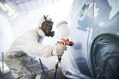 car painting in chamber. automobile repair photo