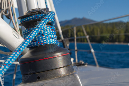 America's Cup sailboat with blue ropes and winch