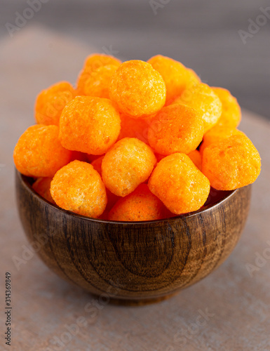 Cheese Covered Ball Snacks in a Bowl on the Counter